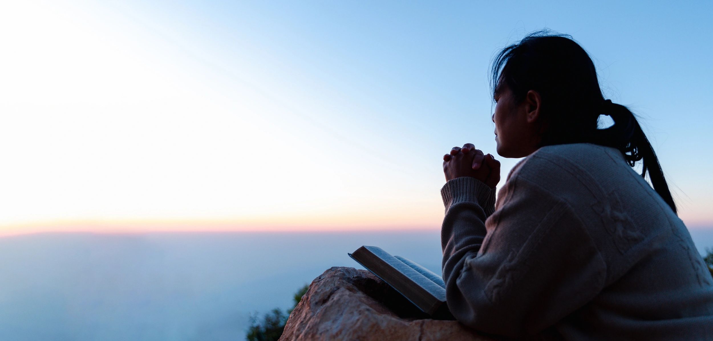 Open Bible with a serene background